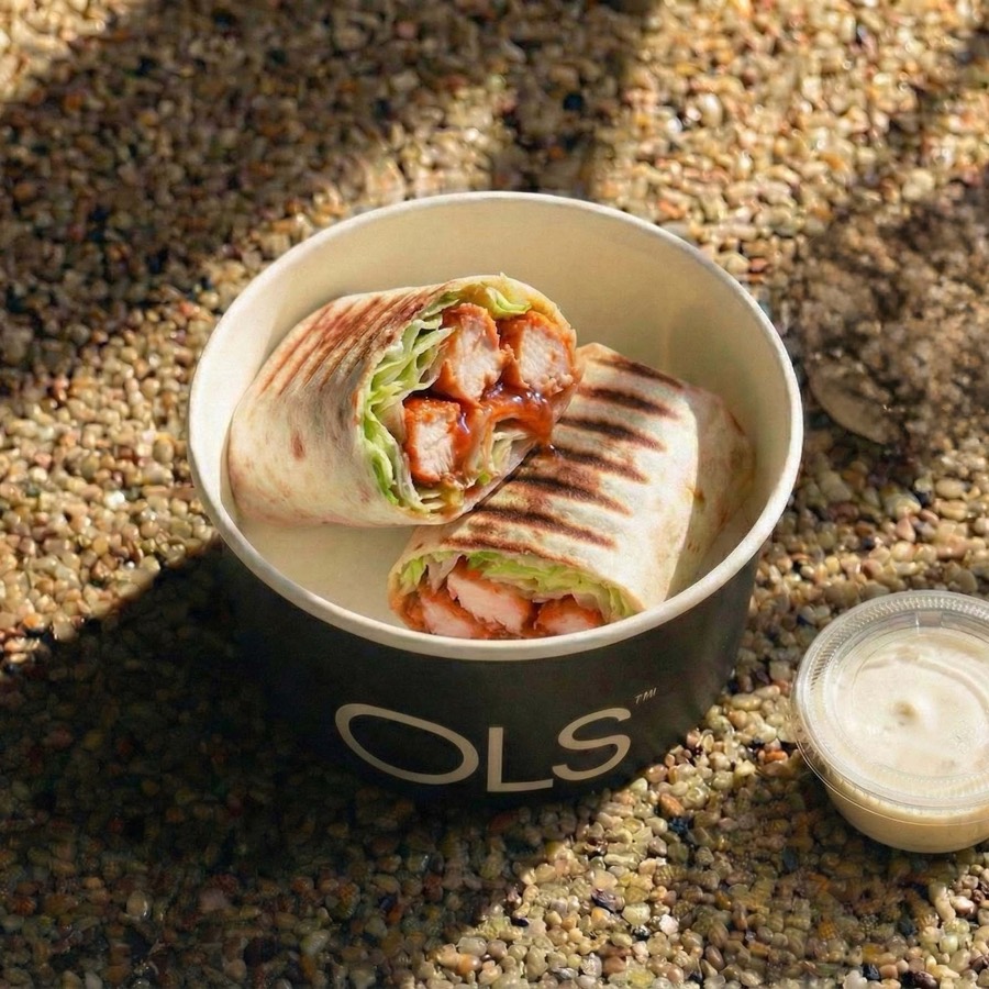 Buffalo Chicken Tortilla — Buffalo chicken, lettuce, ranch wrap — from the OLS menu, Al Khobar
