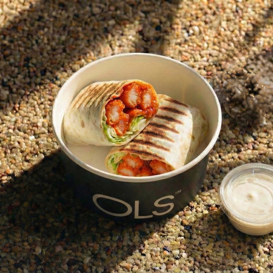 Buffalo Shrimp Tortilla — Crispy shrimp, slaw, buffalo, wrap — from the OLS menu, Al Khobar